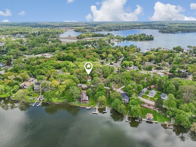 26211 W Spring Grove Rd, Antioch, IL 60002 - aerial view of residential area featuring a nearby body of water and a tree filled landscape