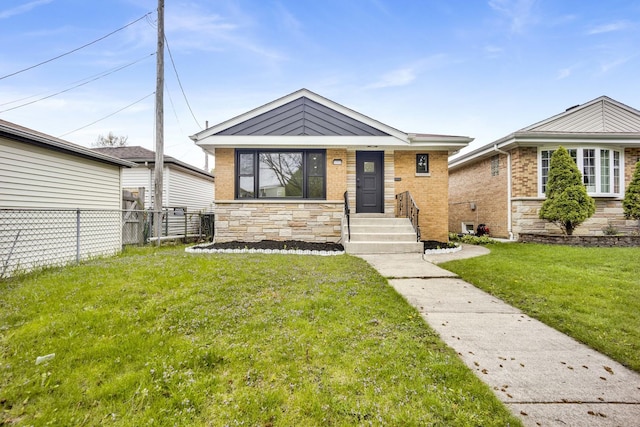 view of front of house with brick siding and stone siding