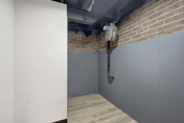 unfinished basement featuring wood finished floors