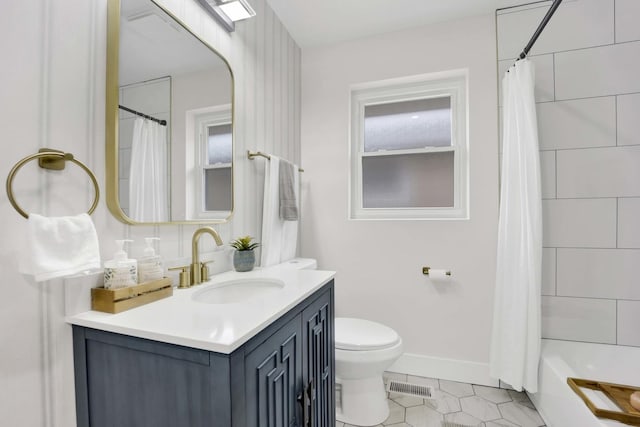 full bath with tile patterned flooring, toilet, vanity, shower / bath combo with shower curtain, and baseboards