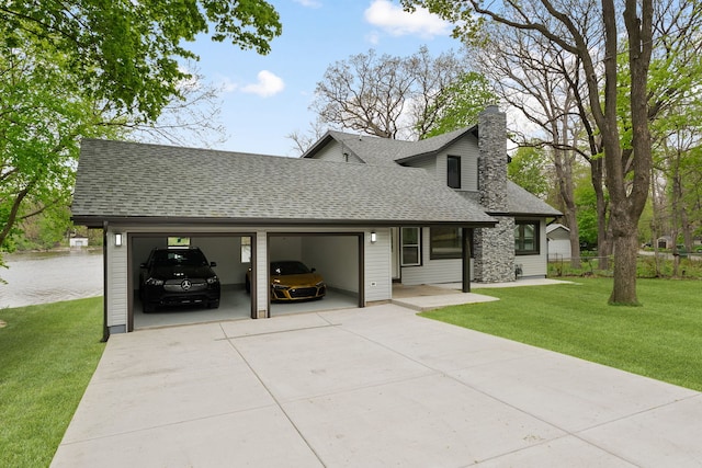 view of front of home with a shingled roof, an attached garage, concrete driveway, a chimney, and a front lawn