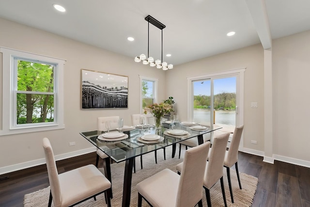 dining room featuring plenty of natural light, dark wood-style flooring, recessed lighting, and baseboards