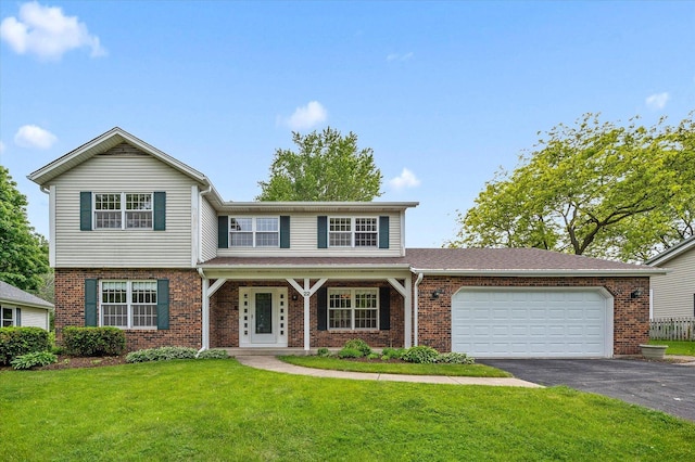 22 Cedar Gate Cir, Sugar Grove, IL 60554 - traditional home featuring asphalt driveway, a garage, brick siding, and a front lawn