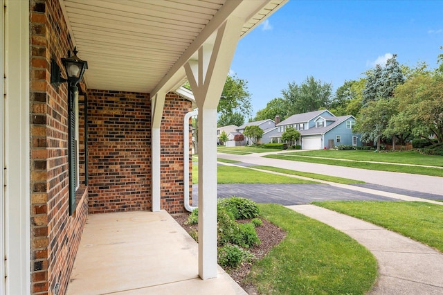 22 Cedar Gate Cir, Sugar Grove, IL 60554 - covered porch with a residential view and a lawn