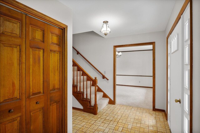 22 Cedar Gate Cir, Sugar Grove, IL 60554 - entrance foyer with baseboards, stairway, and light colored carpet