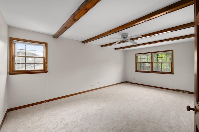 22 Cedar Gate Cir, Sugar Grove, IL 60554 - spare room featuring light carpet, a ceiling fan, baseboards, and beamed ceiling