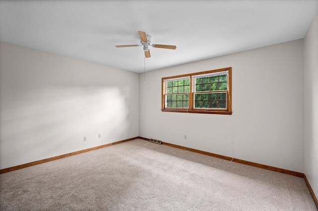 22 Cedar Gate Cir, Sugar Grove, IL 60554 - spare room featuring ceiling fan, light colored carpet, and baseboards