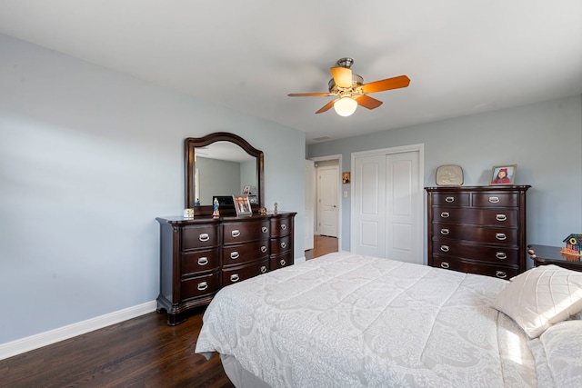 8557 W Winona St, Chicago, IL 60656 - bedroom with dark wood-style flooring, baseboards, a closet, and a ceiling fan