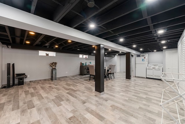8557 W Winona St, Chicago, IL 60656 - finished basement featuring freestanding refrigerator and light wood finished floors