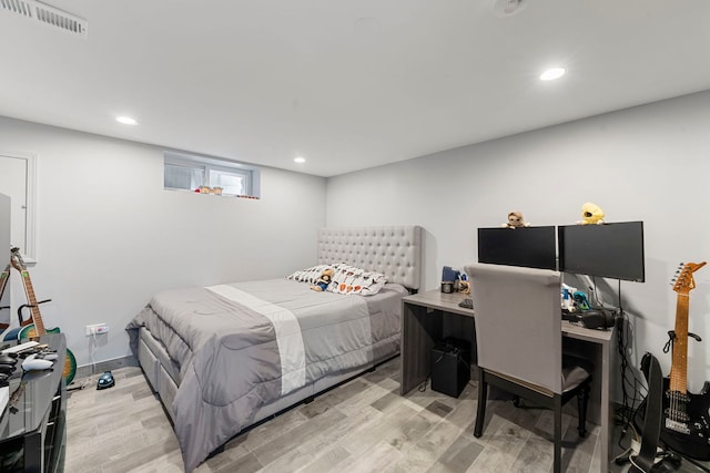 8557 W Winona St, Chicago, IL 60656 - bedroom featuring light wood finished floors and recessed lighting