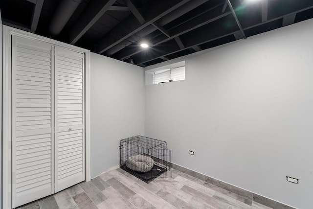 8557 W Winona St, Chicago, IL 60656 - finished basement featuring wood finished floors