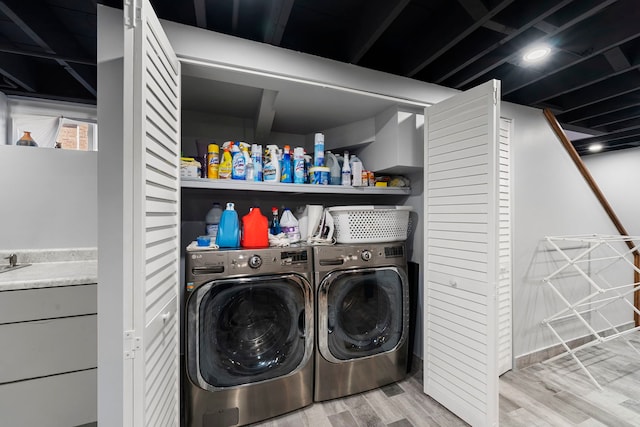 8557 W Winona St, Chicago, IL 60656 - laundry room featuring wood finished floors and washer and clothes dryer