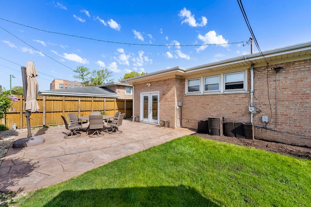 8557 W Winona St, Chicago, IL 60656 - back of house featuring a patio area, french doors, and brick siding