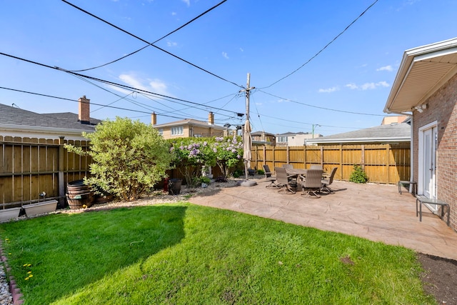 8557 W Winona St, Chicago, IL 60656 - view of yard with a patio