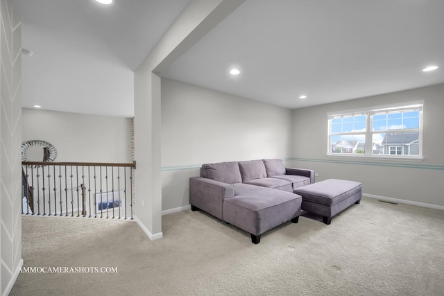living room featuring carpet, recessed lighting, and baseboards