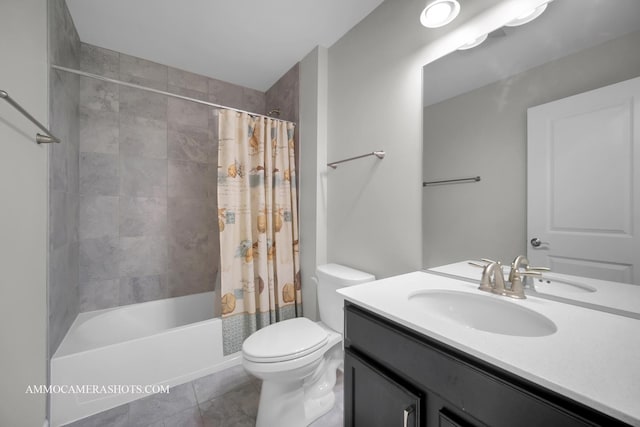 full bath featuring vanity, toilet, tile patterned floors, and shower / tub combo