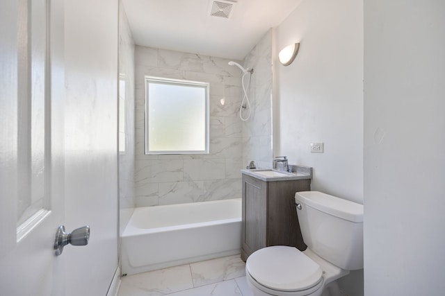 full bathroom featuring toilet, marble finish floors, washtub / shower combination, and vanity