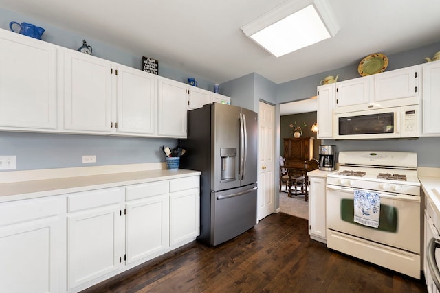 1125 Ironwood Ct, Elgin, IL 60120 - kitchen with white appliances, white cabinetry, light countertops, and dark wood-style flooring