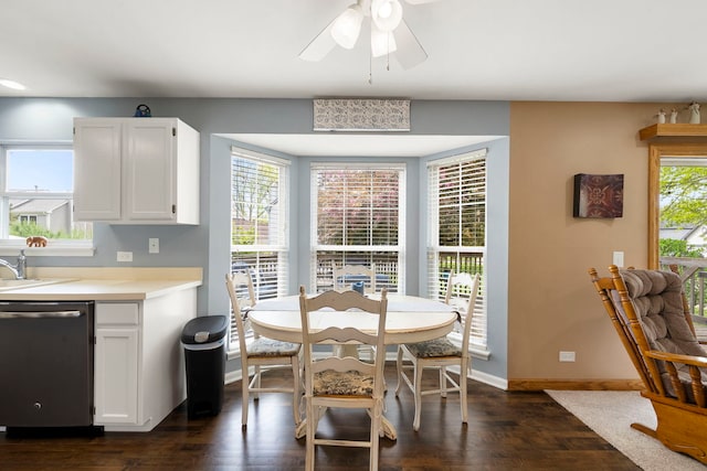 1125 Ironwood Ct, Elgin, IL 60120 - dining space with dark wood-style flooring, a ceiling fan, and baseboards