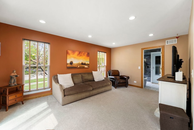 1125 Ironwood Ct, Elgin, IL 60120 - living room with light colored carpet, recessed lighting, healthy amount of natural light, and baseboards