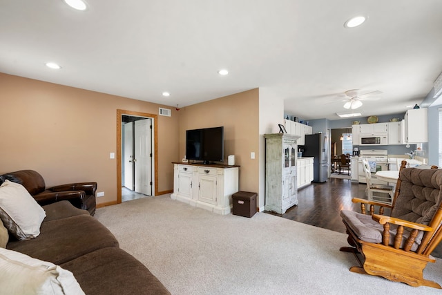 1125 Ironwood Ct, Elgin, IL 60120 - living room with ceiling fan, dark carpet, recessed lighting, and baseboards