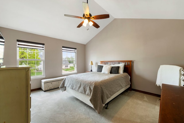 1125 Ironwood Ct, Elgin, IL 60120 - bedroom with light colored carpet, vaulted ceiling, a ceiling fan, and baseboards
