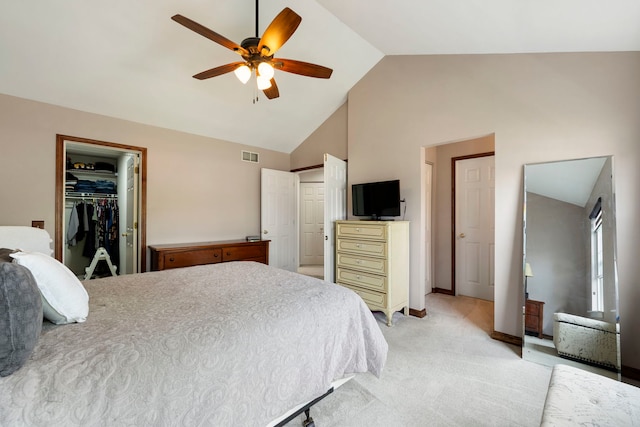 1125 Ironwood Ct, Elgin, IL 60120 - bedroom featuring vaulted ceiling, light colored carpet, ceiling fan, baseboards, and a closet
