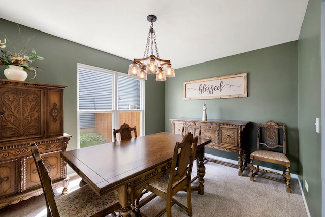 1125 Ironwood Ct, Elgin, IL 60120 - carpeted dining area with a chandelier