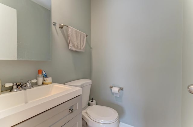 half bath with toilet and vanity