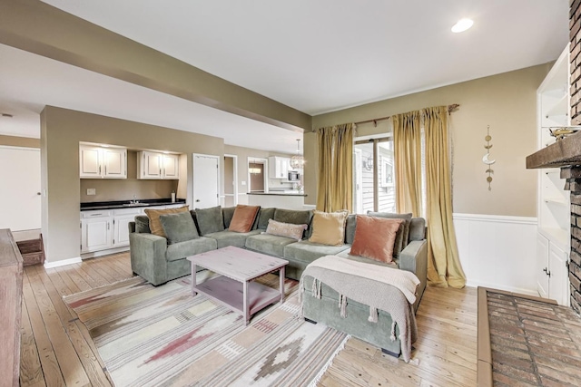 705 Skye Ln, Inverness, IL 60010 - living area featuring light wood finished floors and a wainscoted wall