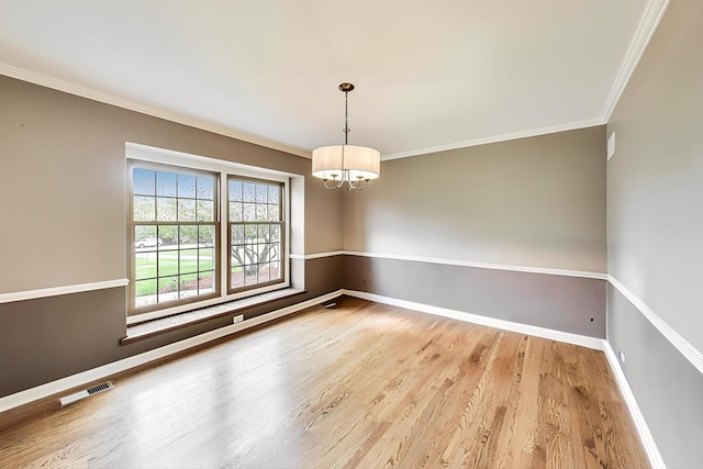 705 Skye Ln, Inverness, IL 60010 - unfurnished room featuring a chandelier, wood finished floors, baseboards, and ornamental molding