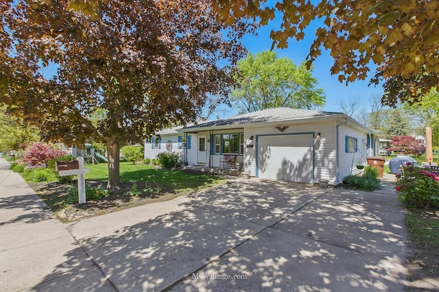 19535 Midland Ave, Mokena, IL 60448 - ranch-style house with an attached garage, a front lawn, concrete driveway, and a playground