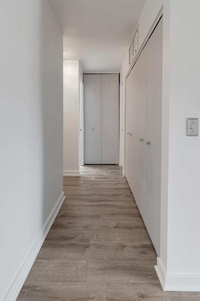 898 Wellington Ave Unit 218, Elk Grove Village, IL 60007 - hall featuring wood finished floors and baseboards