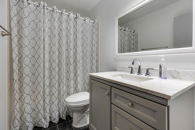 898 Wellington Ave Unit 218, Elk Grove Village, IL 60007 - bathroom with vanity, toilet, tile patterned flooring, and curtained shower