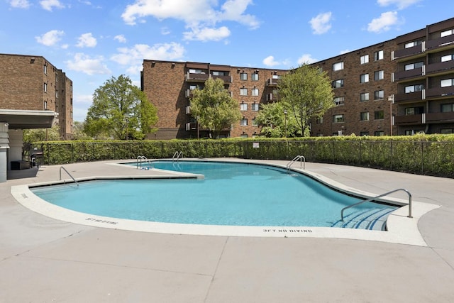 898 Wellington Ave Unit 218, Elk Grove Village, IL 60007 - community pool featuring a patio area
