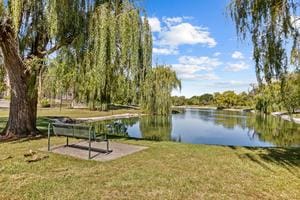 898 Wellington Ave Unit 218, Elk Grove Village, IL 60007 - view of home's community featuring a lawn and a water view