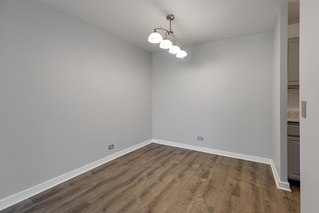 898 Wellington Ave Unit 218, Elk Grove Village, IL 60007 - unfurnished room with dark wood-type flooring and baseboards