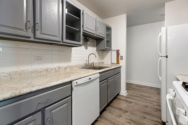898 Wellington Ave Unit 218, Elk Grove Village, IL 60007 - kitchen featuring gray cabinets, white dishwasher, a sink, range, and wood finished floors