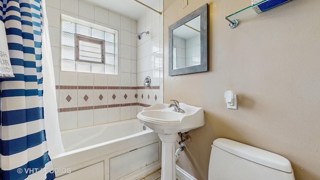 3033 Dora St, Franklin Park, IL 60131 - bathroom with shower / tub combo with curtain and toilet