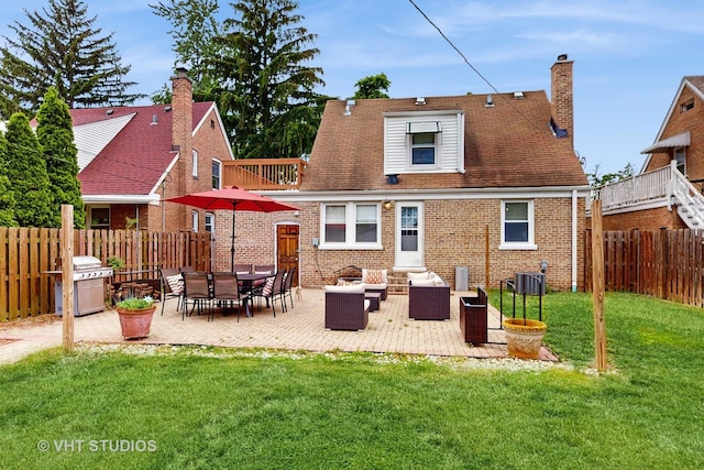 3033 Dora St, Franklin Park, IL 60131 - rear view of property featuring brick siding, an outdoor hangout area, central AC, a chimney, and a patio area