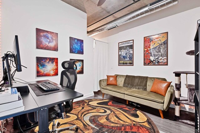 office area with wood finished floors