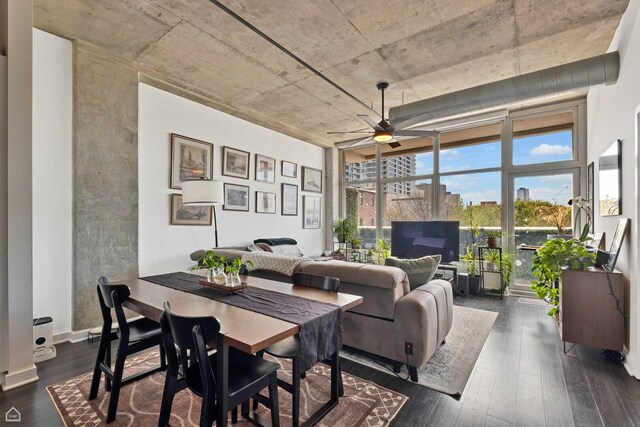 dining room featuring a ceiling fan and dark wood-type flooring