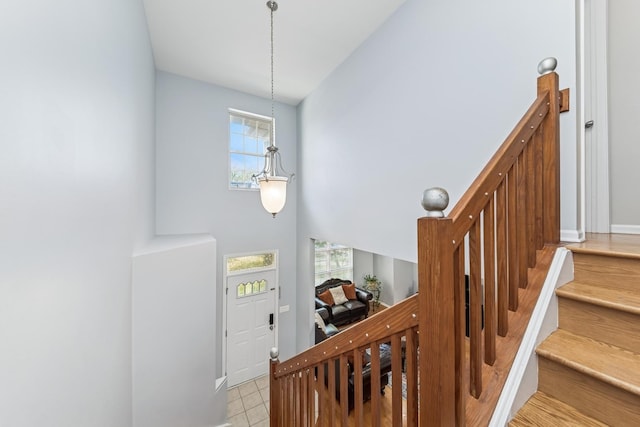 1892 Keystone Pl, Schaumburg, IL 60193 - staircase featuring tile patterned floors and baseboards
