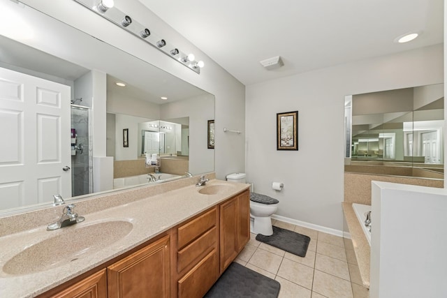 1892 Keystone Pl, Schaumburg, IL 60193 - bathroom with tile patterned flooring, toilet, a shower stall, baseboards, and a bath