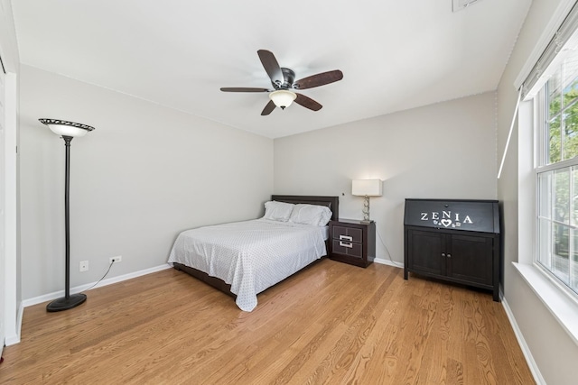 1892 Keystone Pl, Schaumburg, IL 60193 - bedroom featuring light wood finished floors, baseboards, and a ceiling fan
