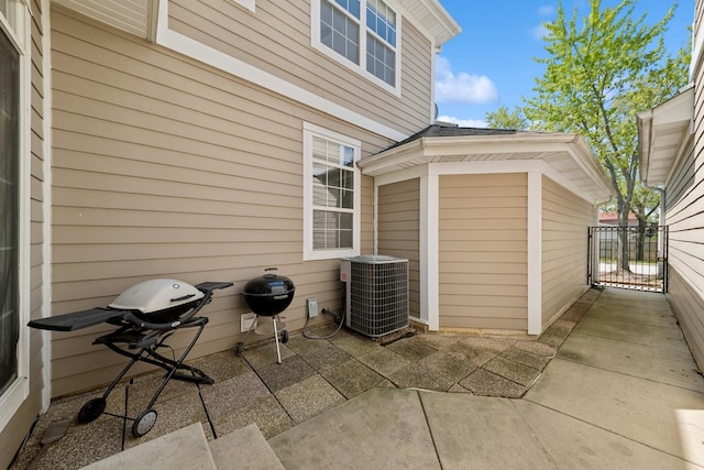 1892 Keystone Pl, Schaumburg, IL 60193 - view of patio featuring central AC and a gate