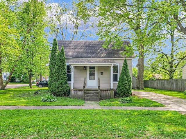 413 E Lincoln St, Monticello, IL 61856 - view of front of home featuring covered porch and roof with shingles