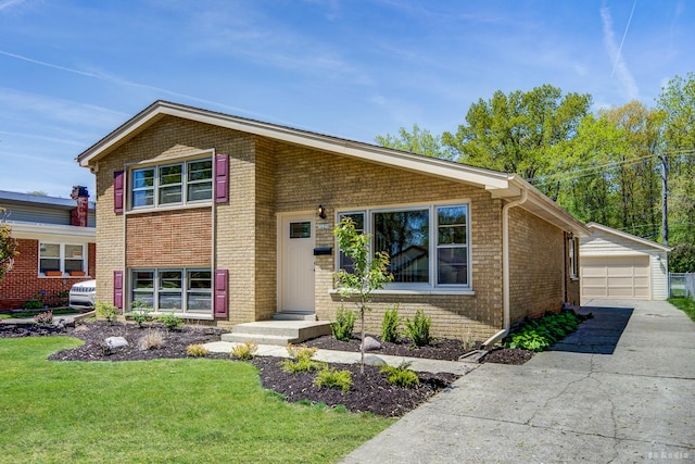 15320 Harding Ave, Midlothian, IL 60445 - tri-level home featuring brick siding, an outbuilding, a front yard, and a garage