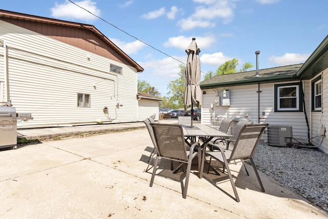 view of patio / terrace featuring cooling unit and outdoor dining area
