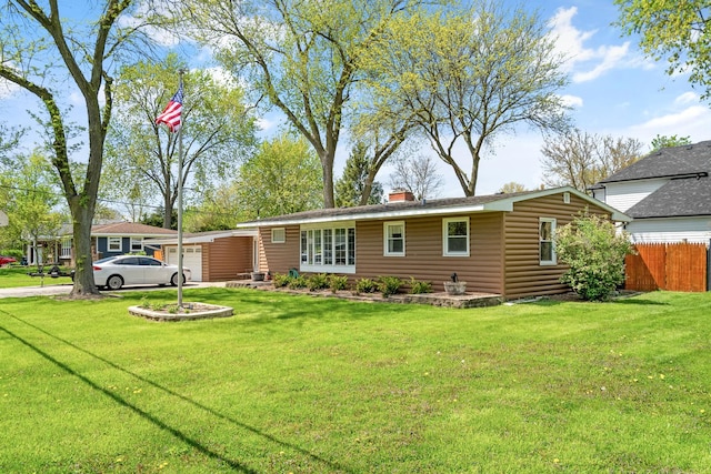 ranch-style home with faux log siding, a chimney, and driveway